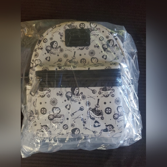 Loungefly - EXCLUSIVE - LAIKA CORALINE TATTOO AOP MINI BACKPACK - Picture 6 of 9